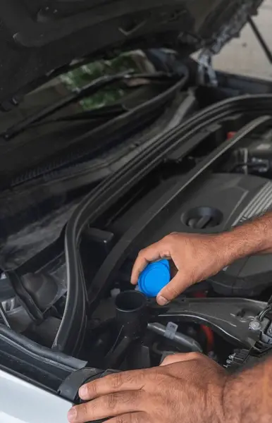 auto-mechanic-working-garage-600nw-2688745123